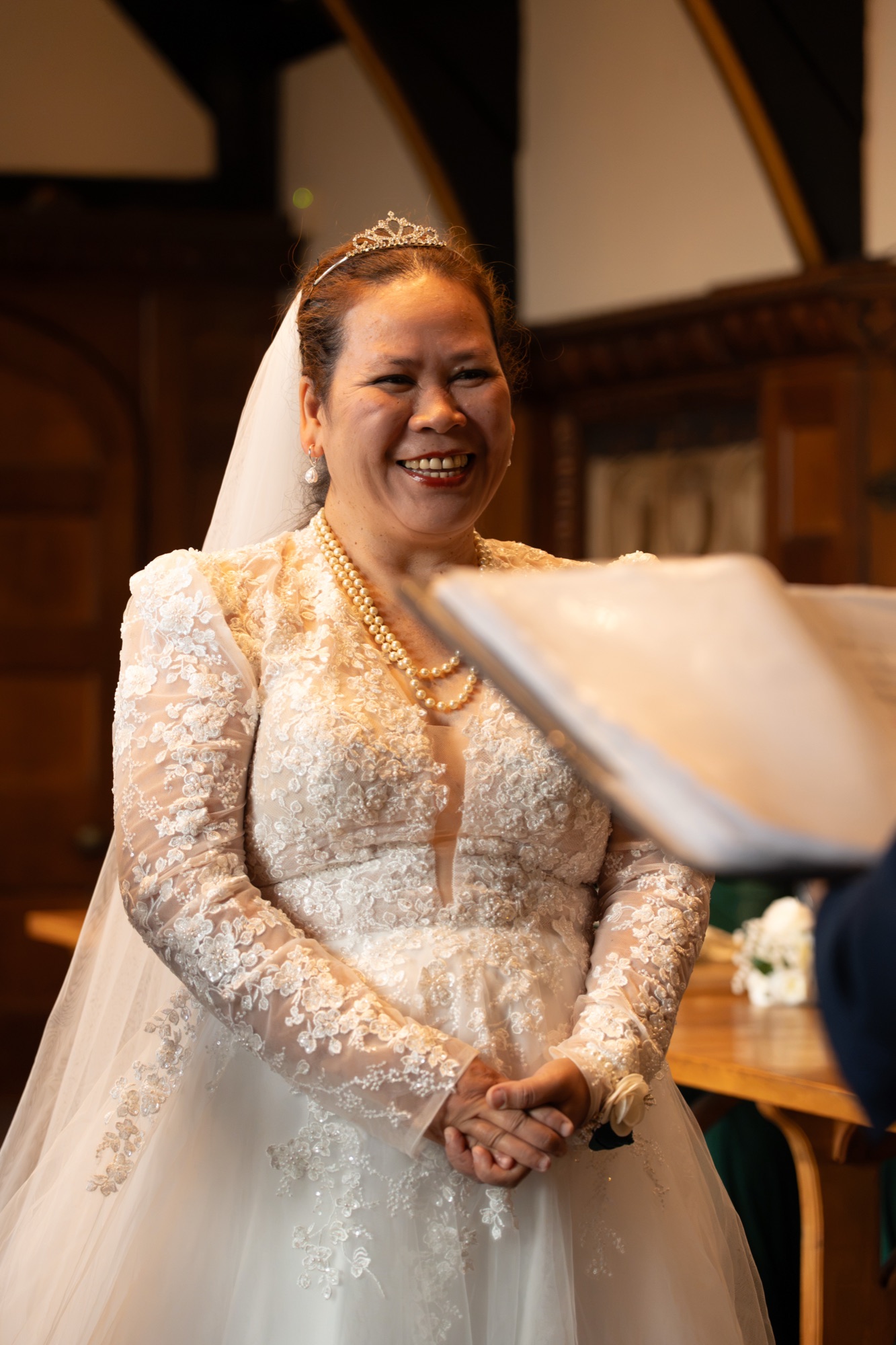 The bride smiling during the ceremony